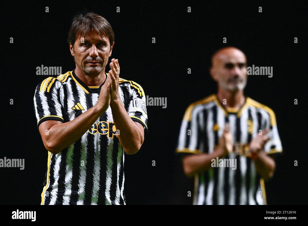 Turin, Italy. 10 October 2023. Antonio Conte and Pablo Montero gesture during the 'Together, a Black & White Show', an event organized by Juventus FC as of the celebrations for the 100 years of the Agnelli family as president of the club. Credit: Nicolò Campo/Alamy Live News Stock Photo