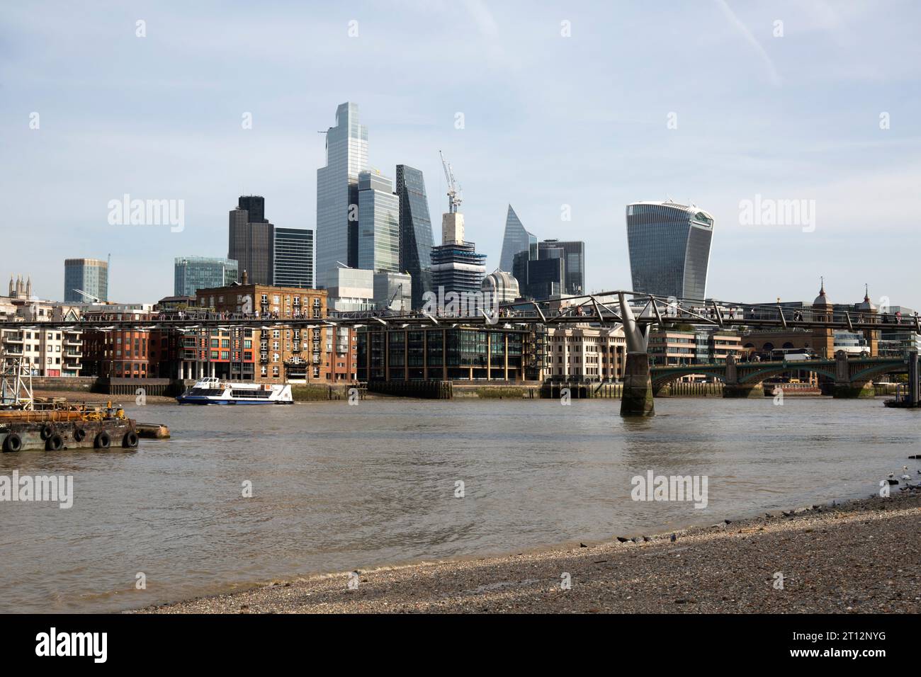 City of London Skyline and River Thames Viewed from Beach Stock Photo