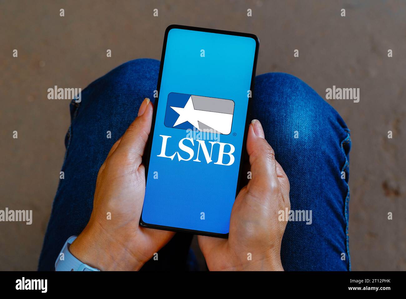 In this photo illustration, the Lone Star National Bank (LSNB) logo is ...