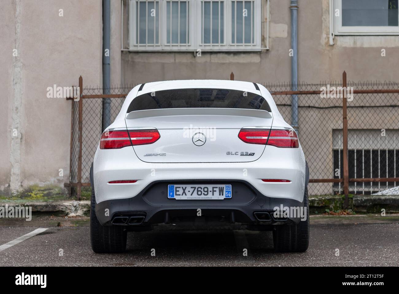 White Mercedes-AMG GLC 63 S Coupe parked in a street Stock Photo