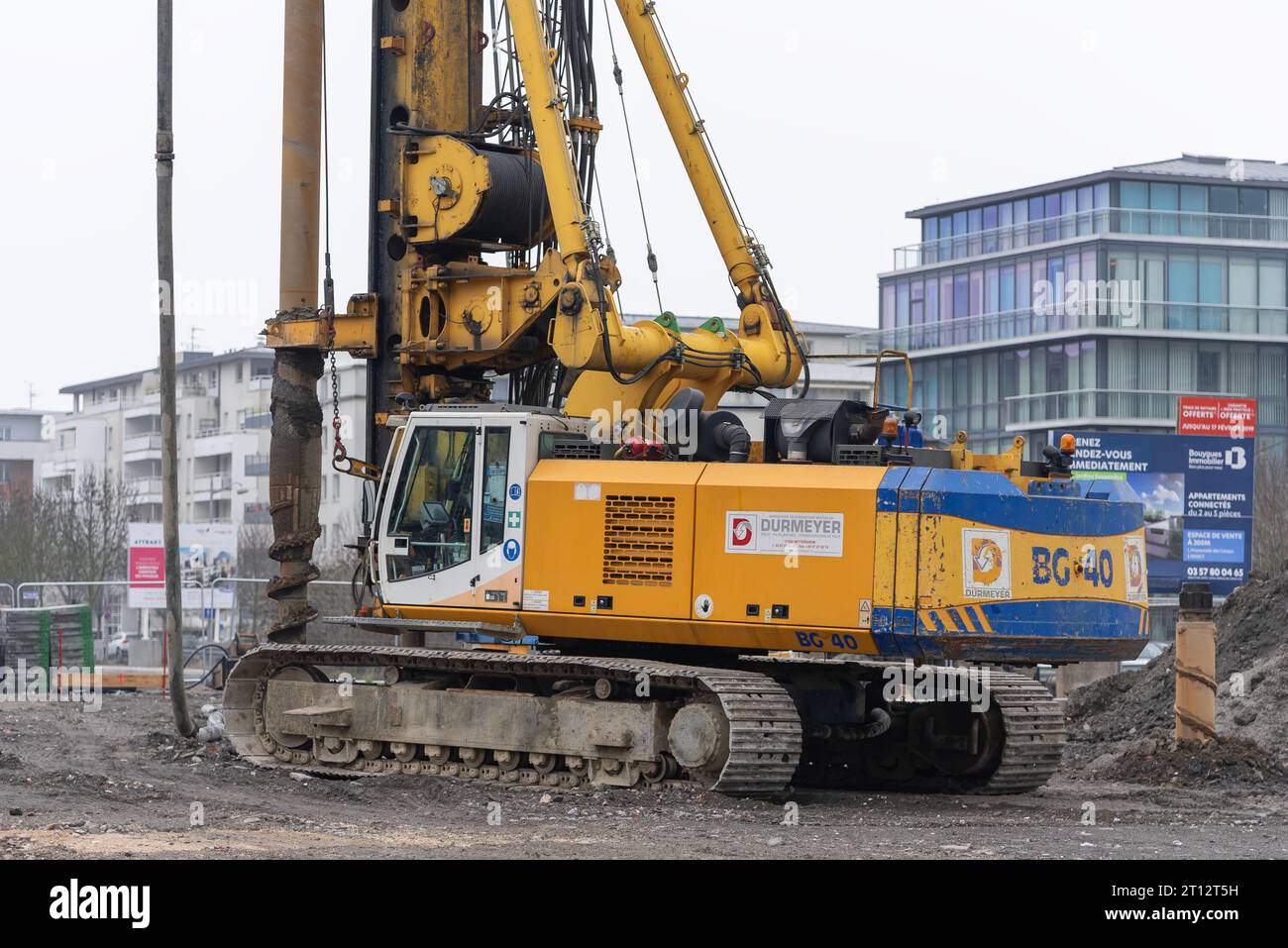 Yellow drilling rig Bauer BG 40 on construction site Stock Photo