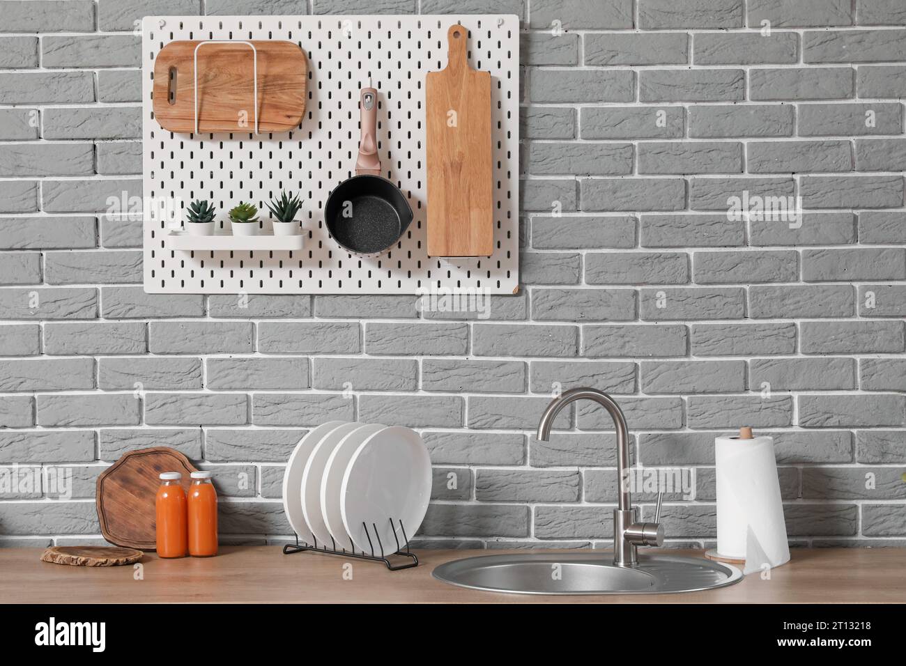 Sink, plate rack and utensils on white counters in modern kitchen Stock Photo Alamy
