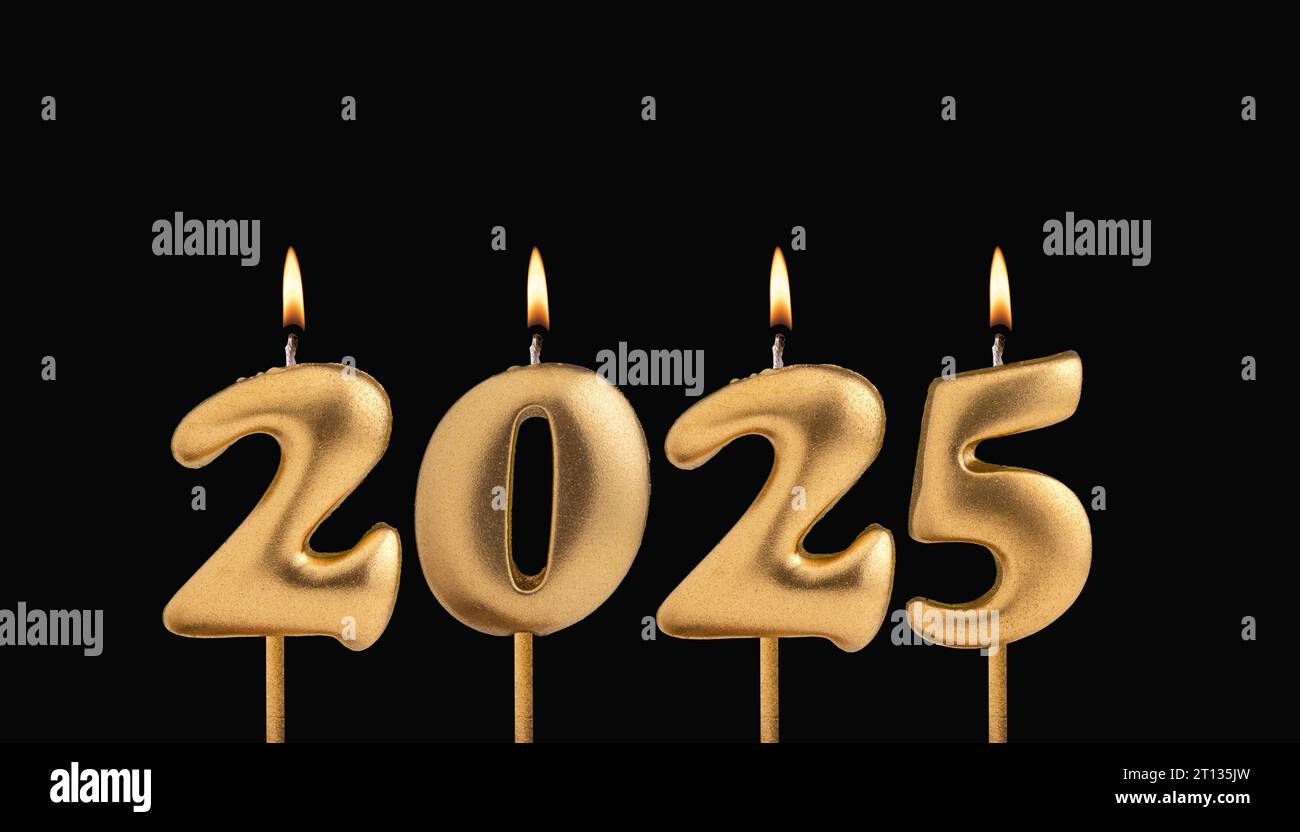 Happy New Year 2025 Candles in the form of burning numbers on a black background Stock Photo