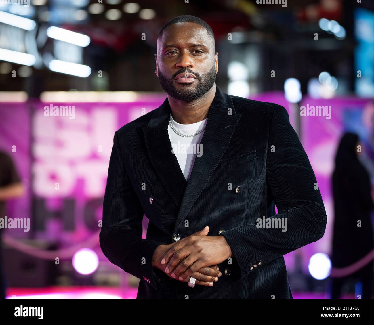 Lethal Bizzle poses for photographers upon arrival for the World premiere film 