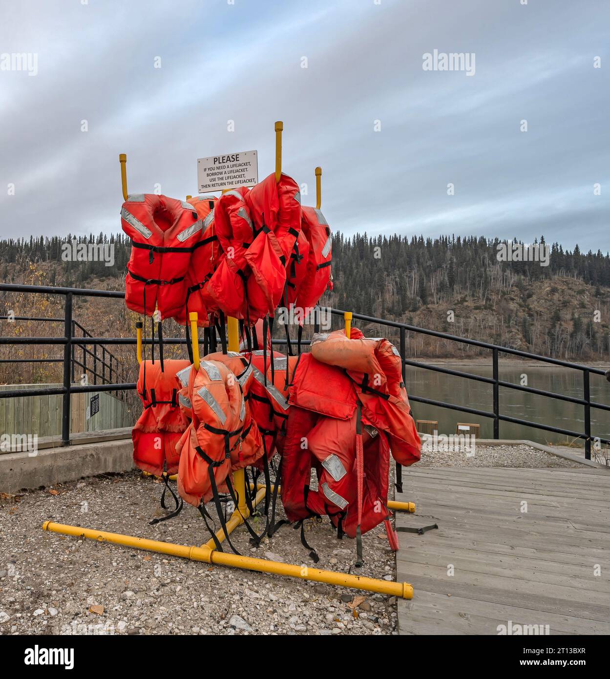 Life jackets to borrow on the shore of the Yukon River at Dawson City, Yukon, Canada Stock Photo