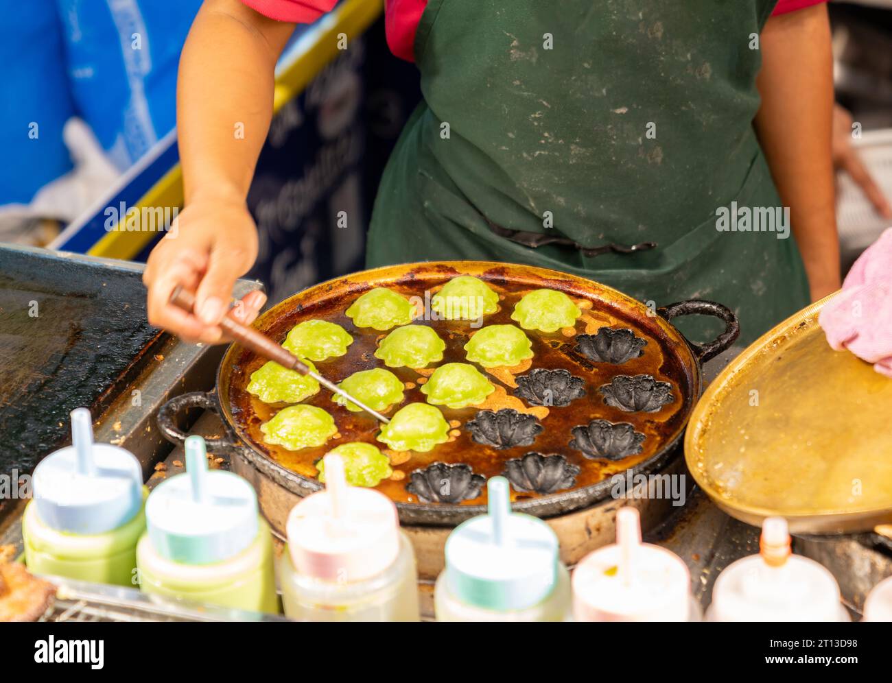 Trader pick modern thai seetmeat in street market. Stock Photo