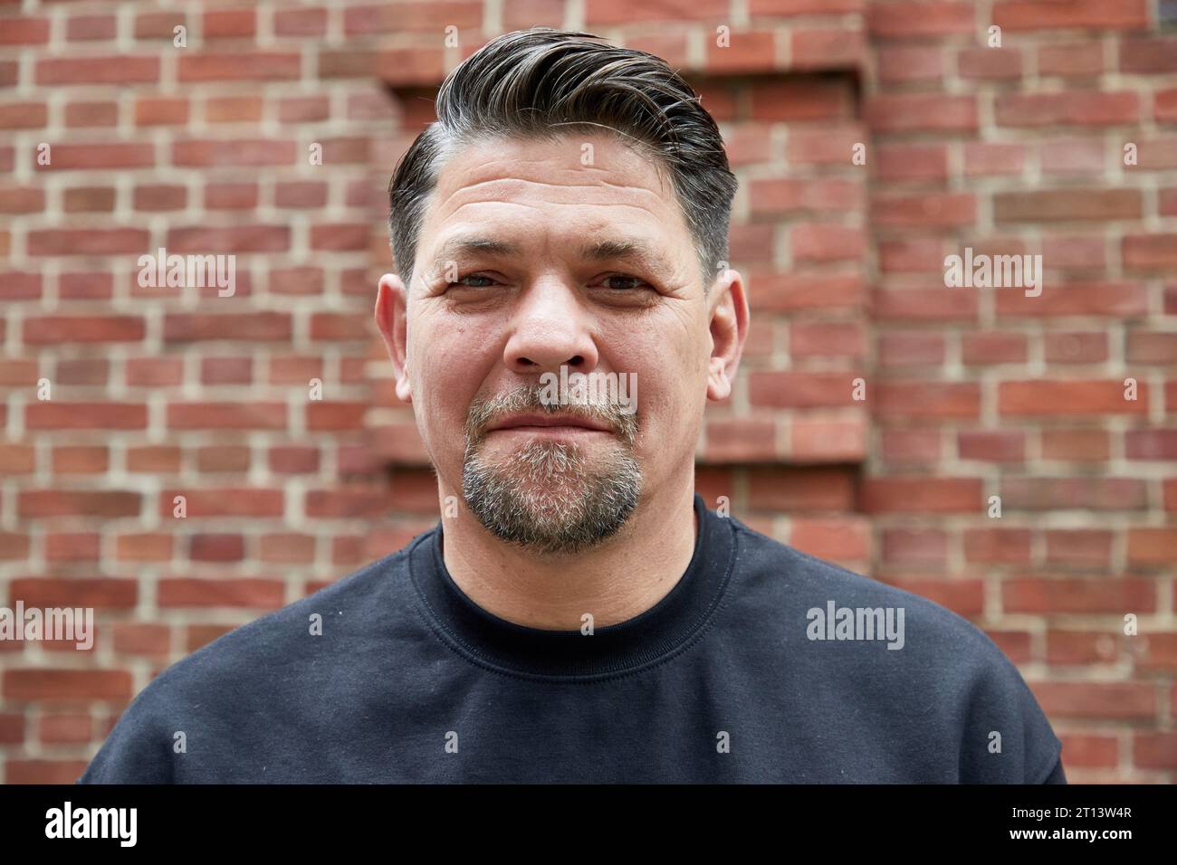 Hamburg, Germany. 18th Sep, 2023. Tim Mälzer, chef and author, stands in front of the restaurant 'Bullerei' on the occasion of an interview about his new book and the situation of pubs in Hamburg. Credit: Georg Wendt/dpa/Alamy Live News Stock Photo
