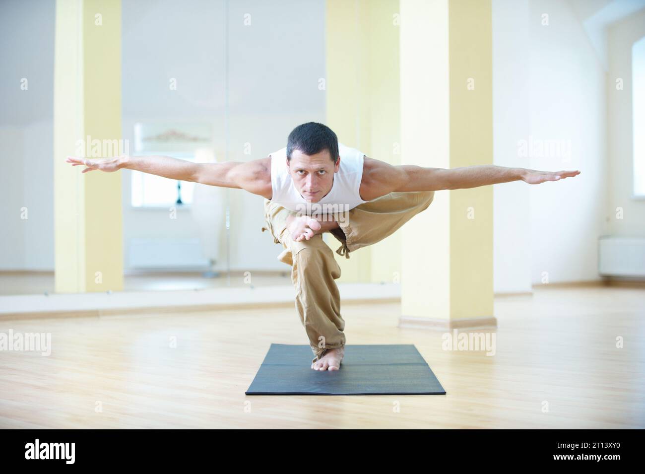 Strong man stands arms hi-res stock photography and images - Alamy
