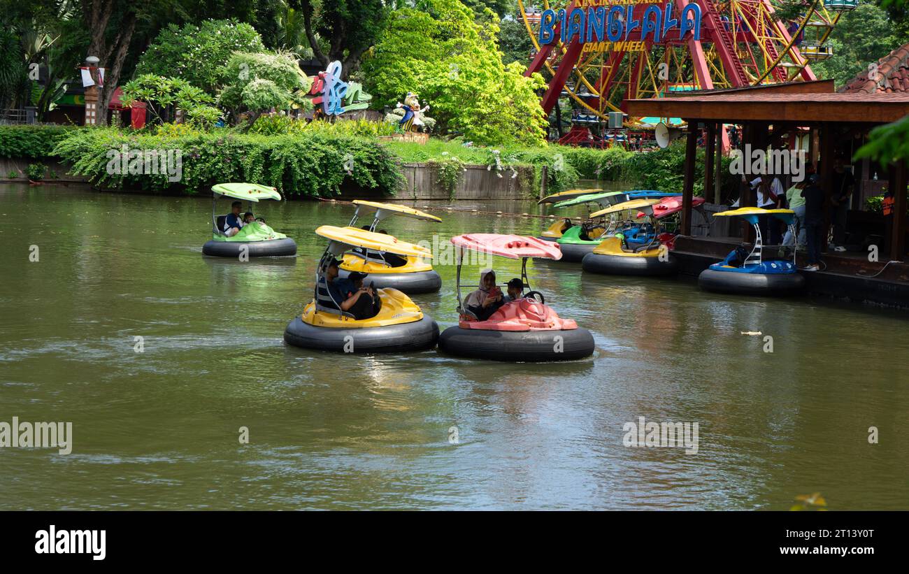Water duck rides are one of visitors' favorites when visiting the favorite family entertainment rides in the city Stock Photo