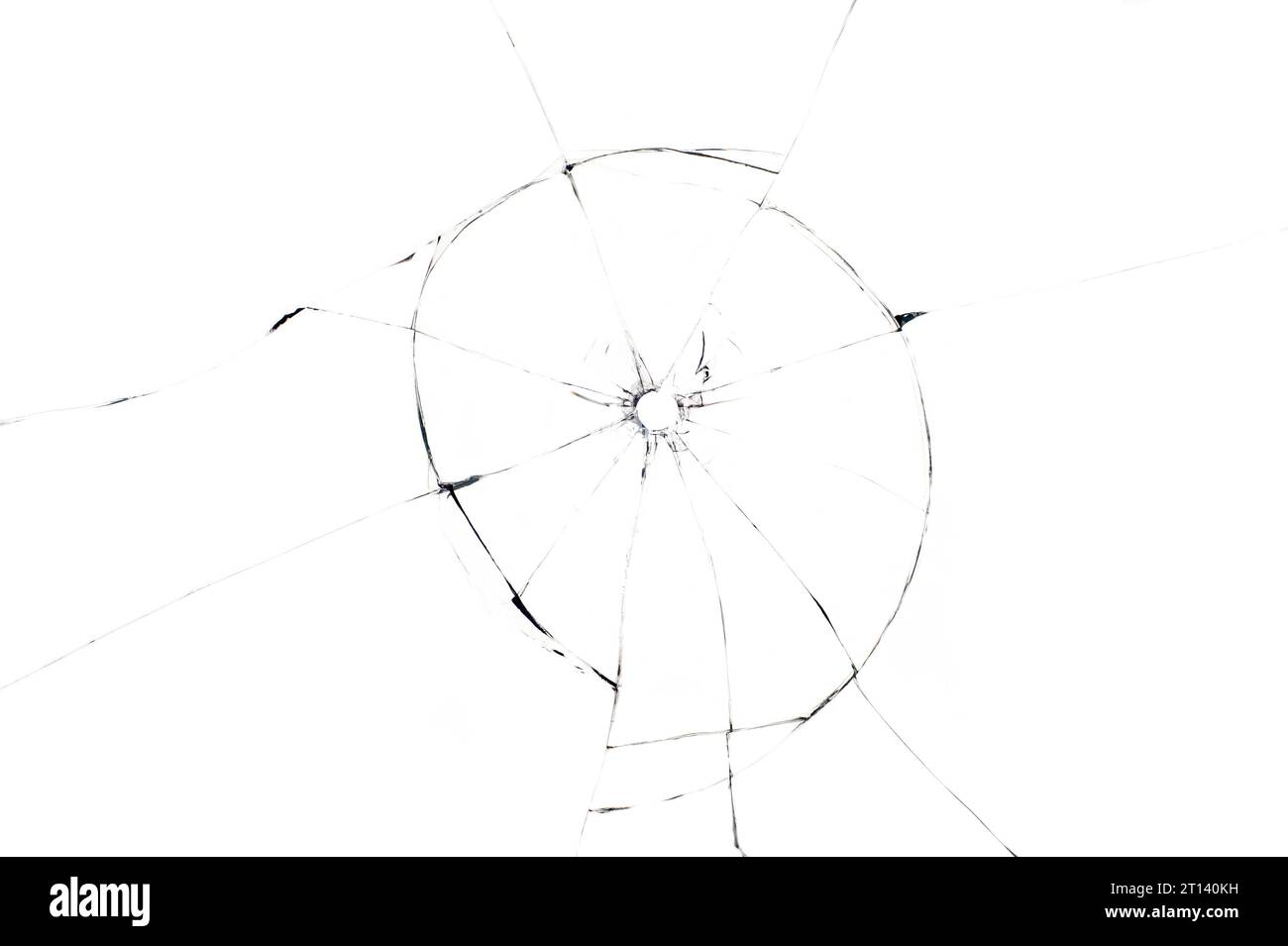 bullet hole in glass closeup on white background Stock Photo