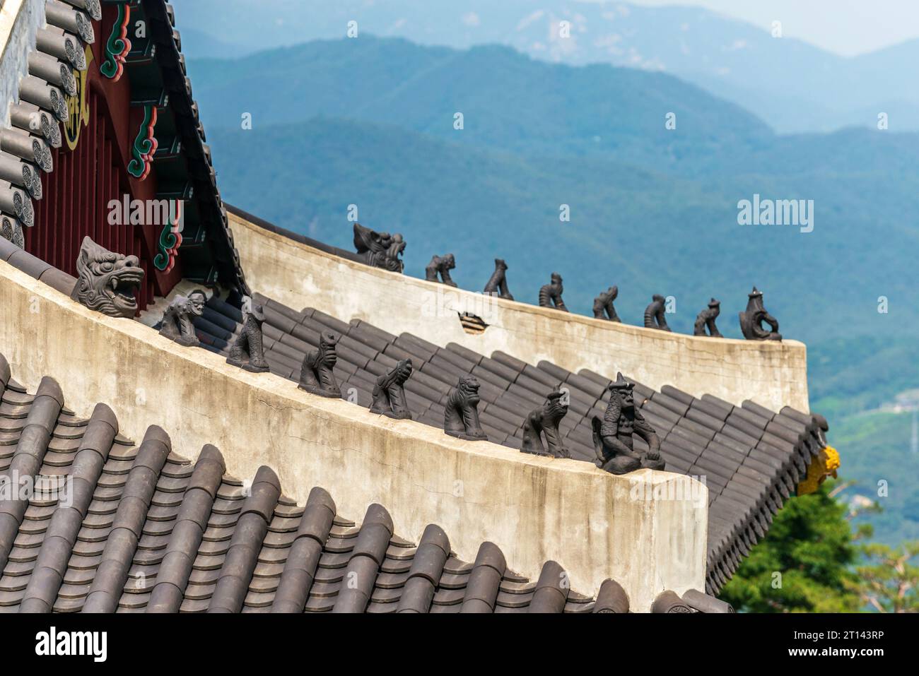 Close up of animal figures on the roof of a traditional Korean building Stock Photo