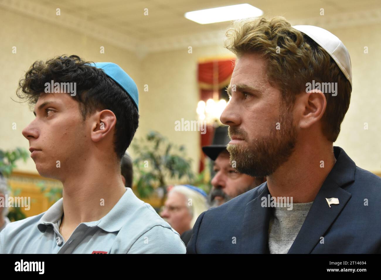 Fair Lawn, United States. 10th Oct, 2023. Worshipper (LEFT) listens to