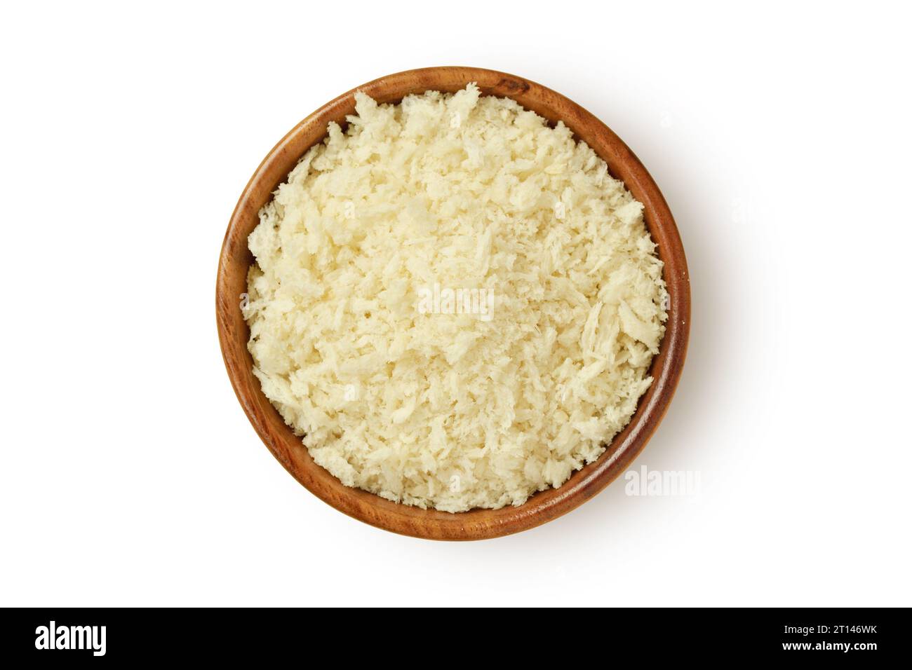 Panko flakes of bread crumbs in wooden bowl on white background Stock
