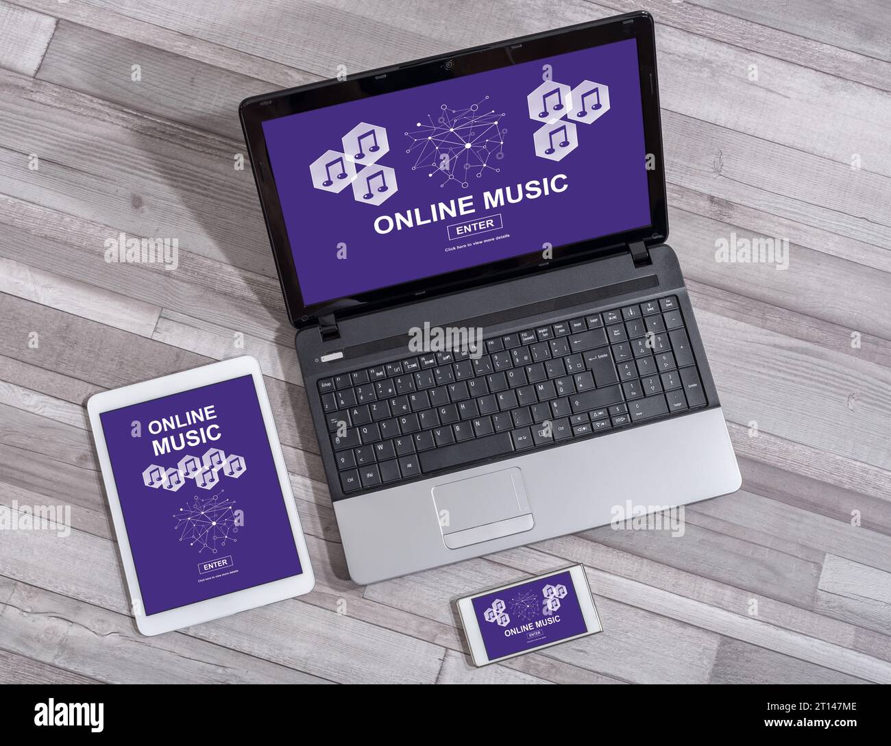Online music concept shown on different information technology devices Stock Photo