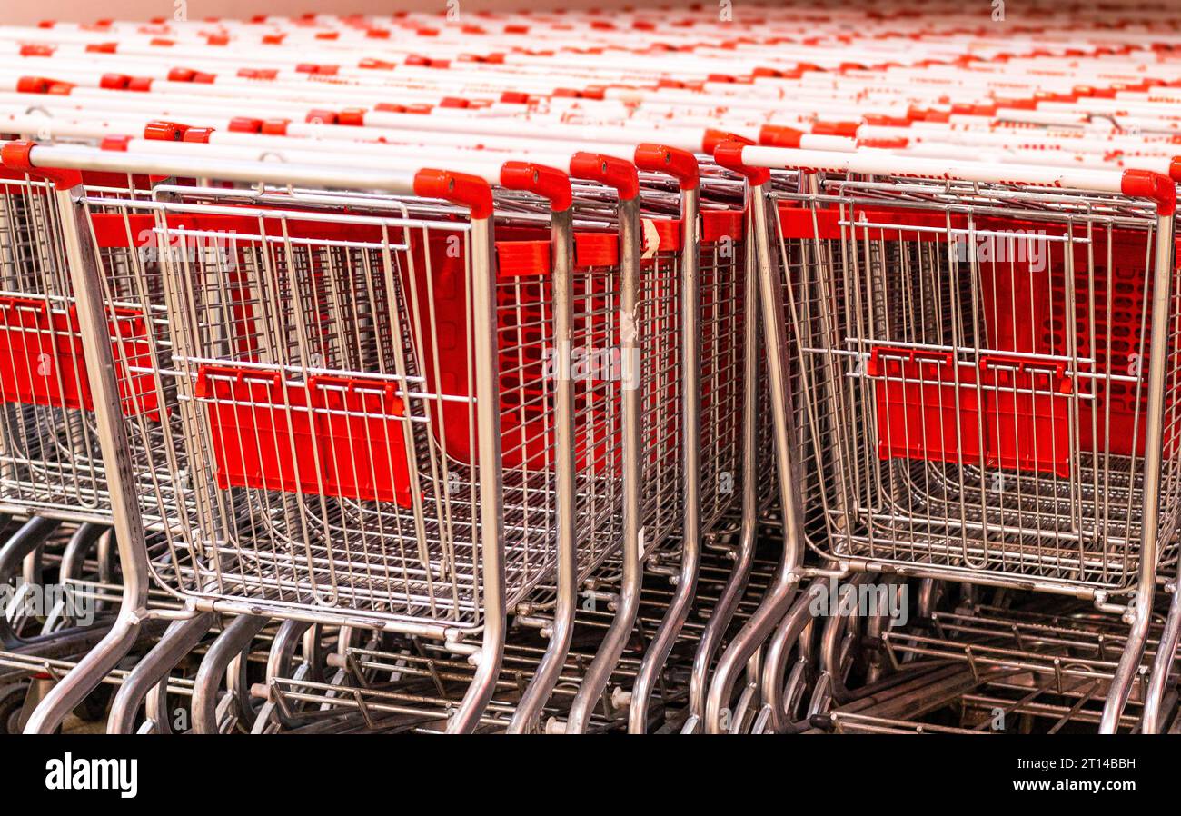 Trolley in the store. carts. Concept buyers, customer, purchaser, shopper, bidder, acquirer Stock Photo