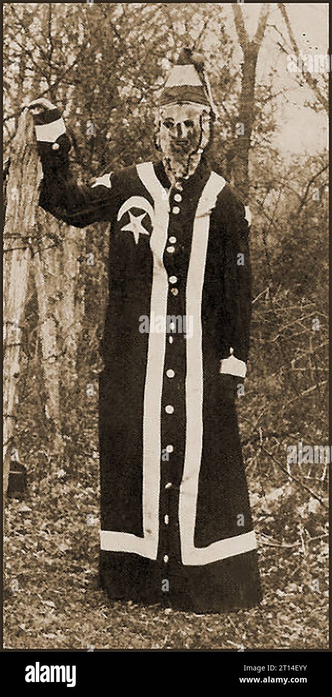 A portrait of R.J. Brunson in a Ku Klux Klan uniform and mask 1930's In the late 1800's he was allegedly Secretary of Den No. 4. of the   firstPulaski,  Tennessee  KKK group Stock Photo
