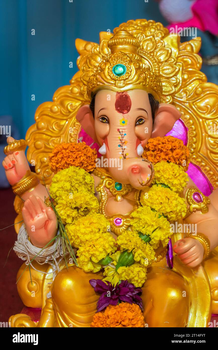 A beautiful idol of Lord Ganesha being worshipped at a mandal in Mumbai ...