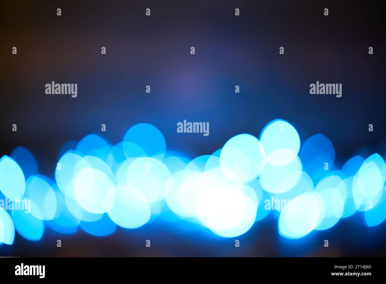 Blue bokeh abstract background with copy space Stock Photo