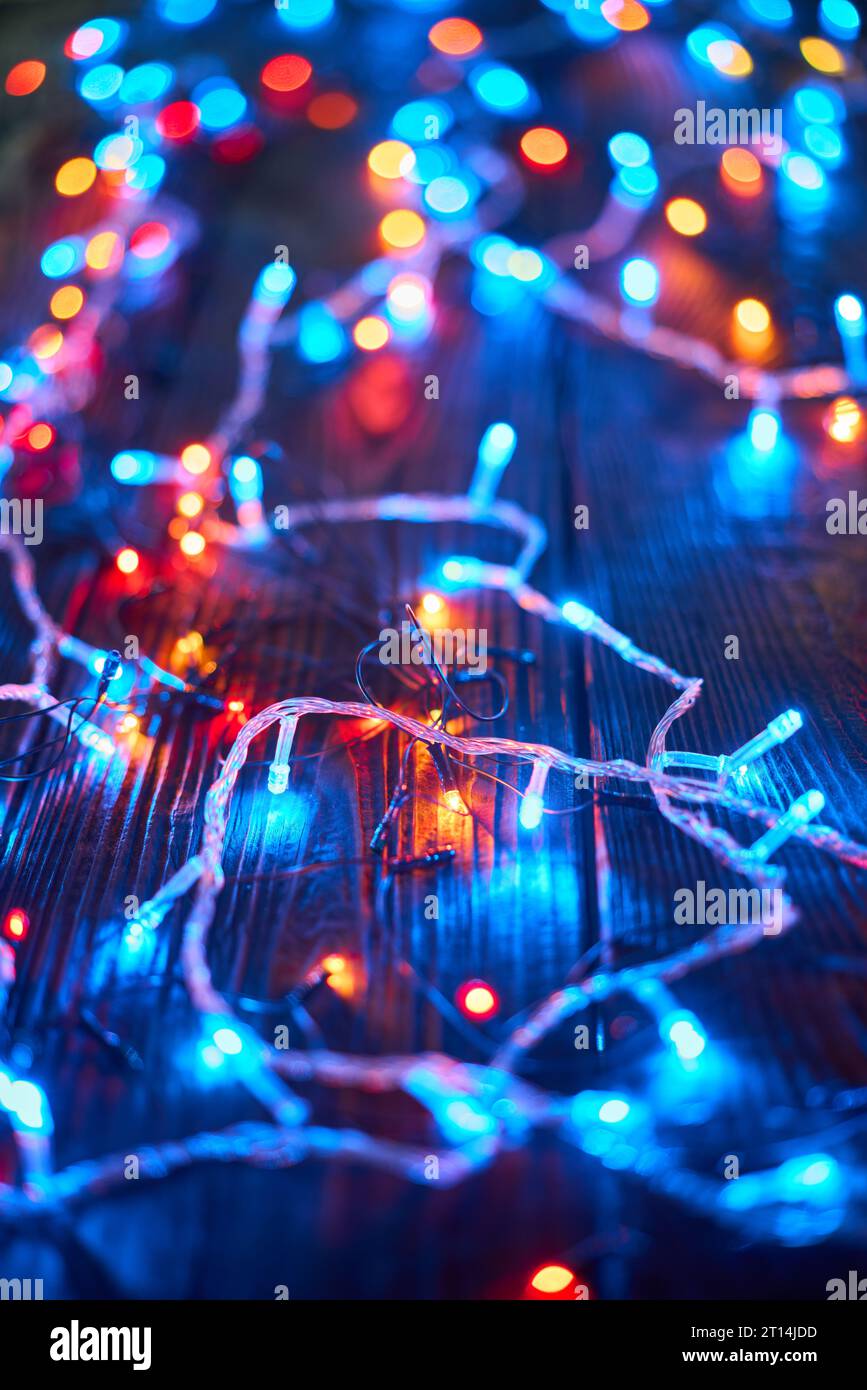 Colorful christmas lights background. Merry Christmas and Happy New Year festive composition Stock Photo