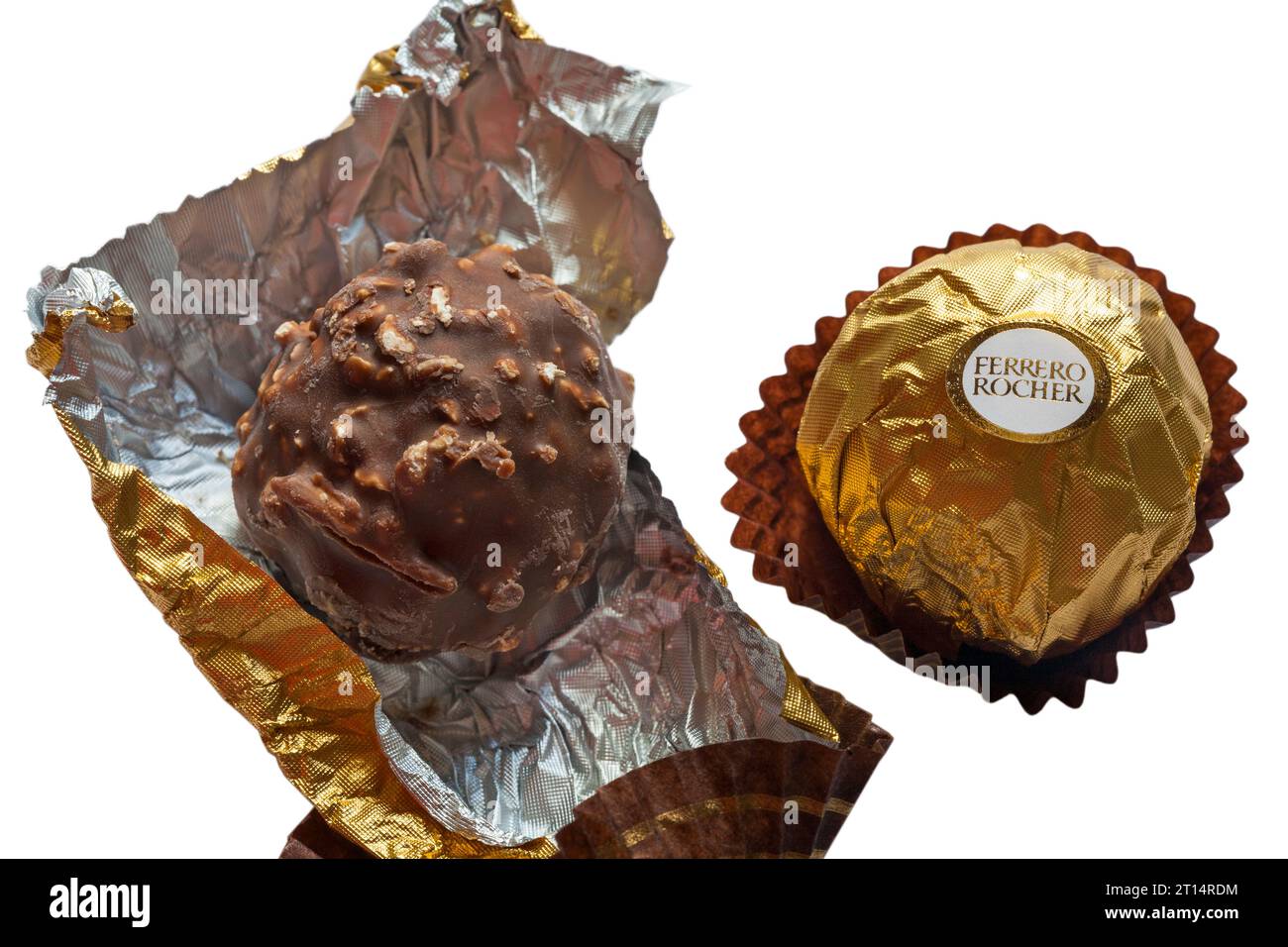 Ferrero Rocher chocolates, one wrapped one unwrapped set on white