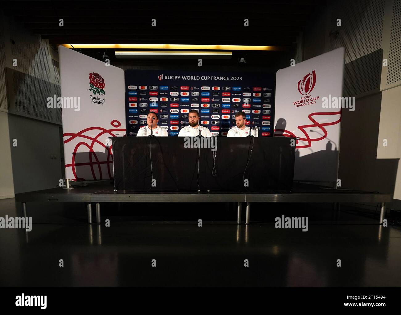 England's Jamie George, scrum coach Tom Harrison, and Elliot Daly during a press conference at the Conservatoire Darius Milhaud in Aix-en-Provence, France. Picture date: Wednesday October 11, 2023. Stock Photo