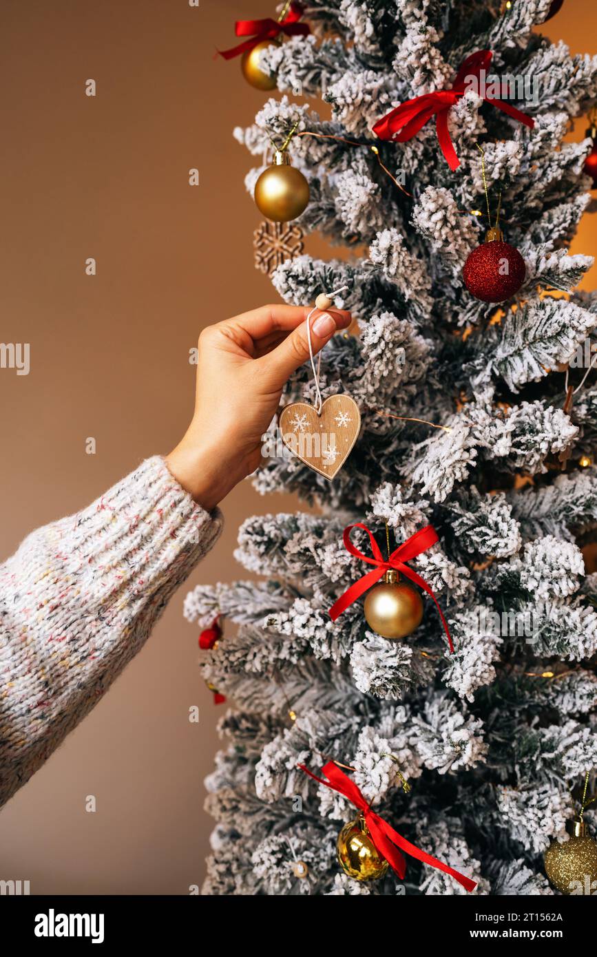 Decorating the Christmas tree. Christmas and New Year preparing. Stock Photo