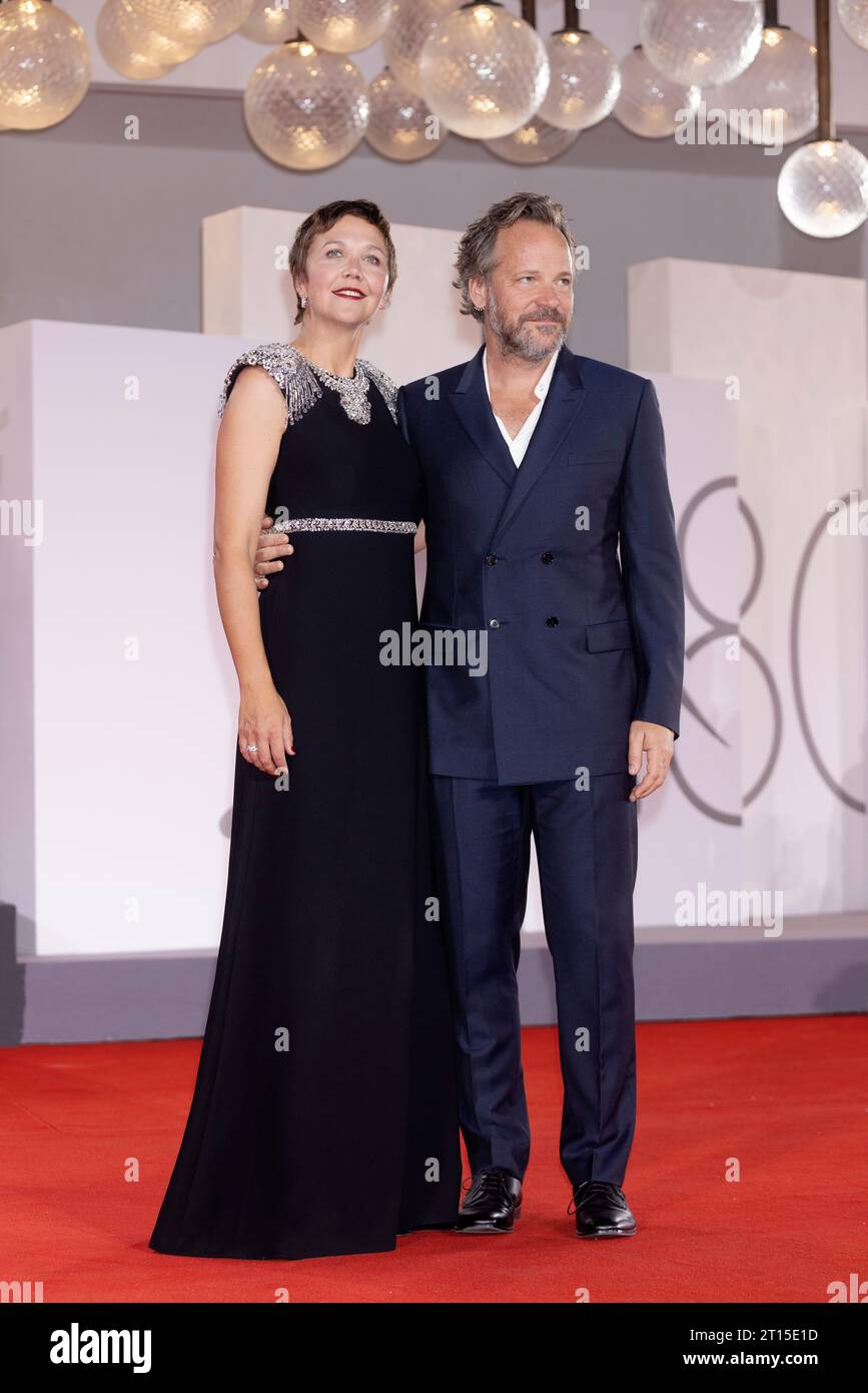 VENICE, ITALY - SEPTEMBER 08: Maggie Gyllenhaal and Peter Sarsgaard attend the red carpet for the movie 'Memory' at the 80th Venice International Film Stock Photo