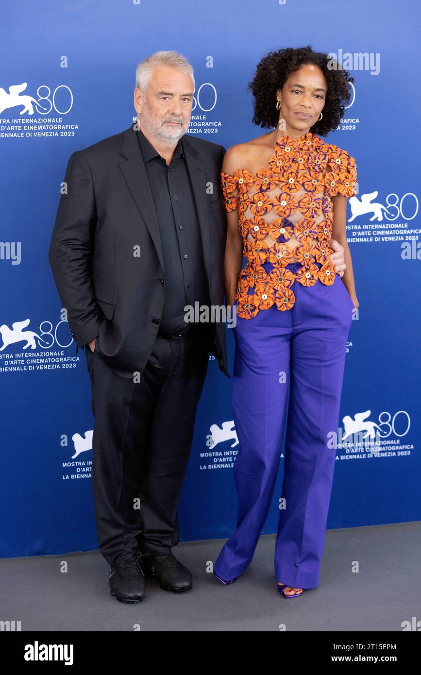 VENICE, ITALY - SEPTEMBER 08: Director Luc Besson and Virginie Besson-Silla attend the photo-call for the movie ÒDogmanÓ at the 80th Venice Internatio Stock Photo