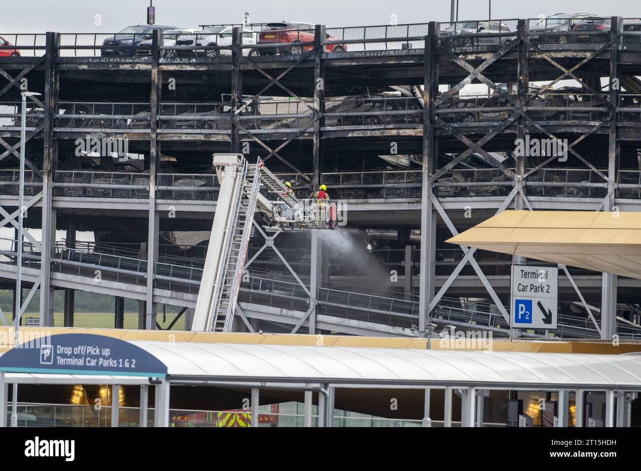 London, UK. 11th Oct, 2023. Fire crew members work at the site of a