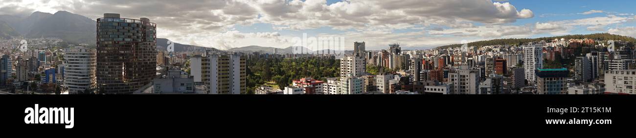 Panoramic view of the north central area of the city of Quito during a cloudy sunset. Ecuador Stock Photo