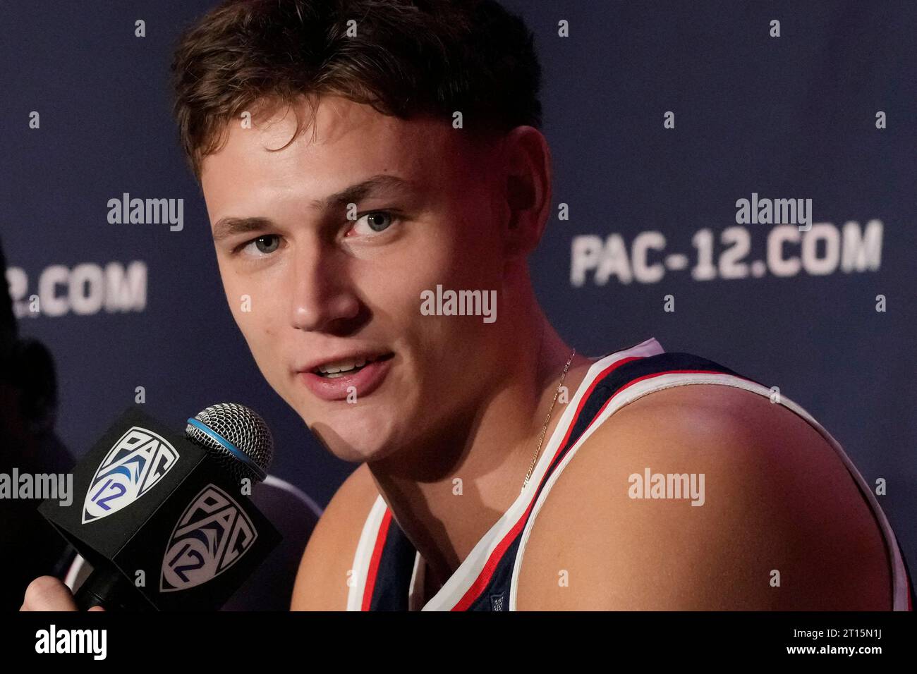 Arizona’s Pelle Larsson speaks during a news conference at the Pac-12
