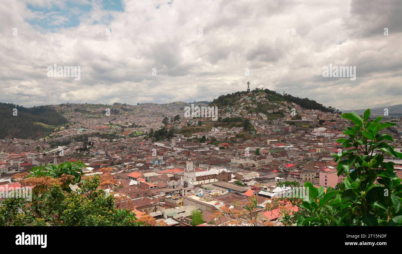 Quito, Pichincha / Ecuador - September 30 2023: Panoramic view of the historic center of the city of Quito with El Panecillo on the horizon during a c Stock Photo