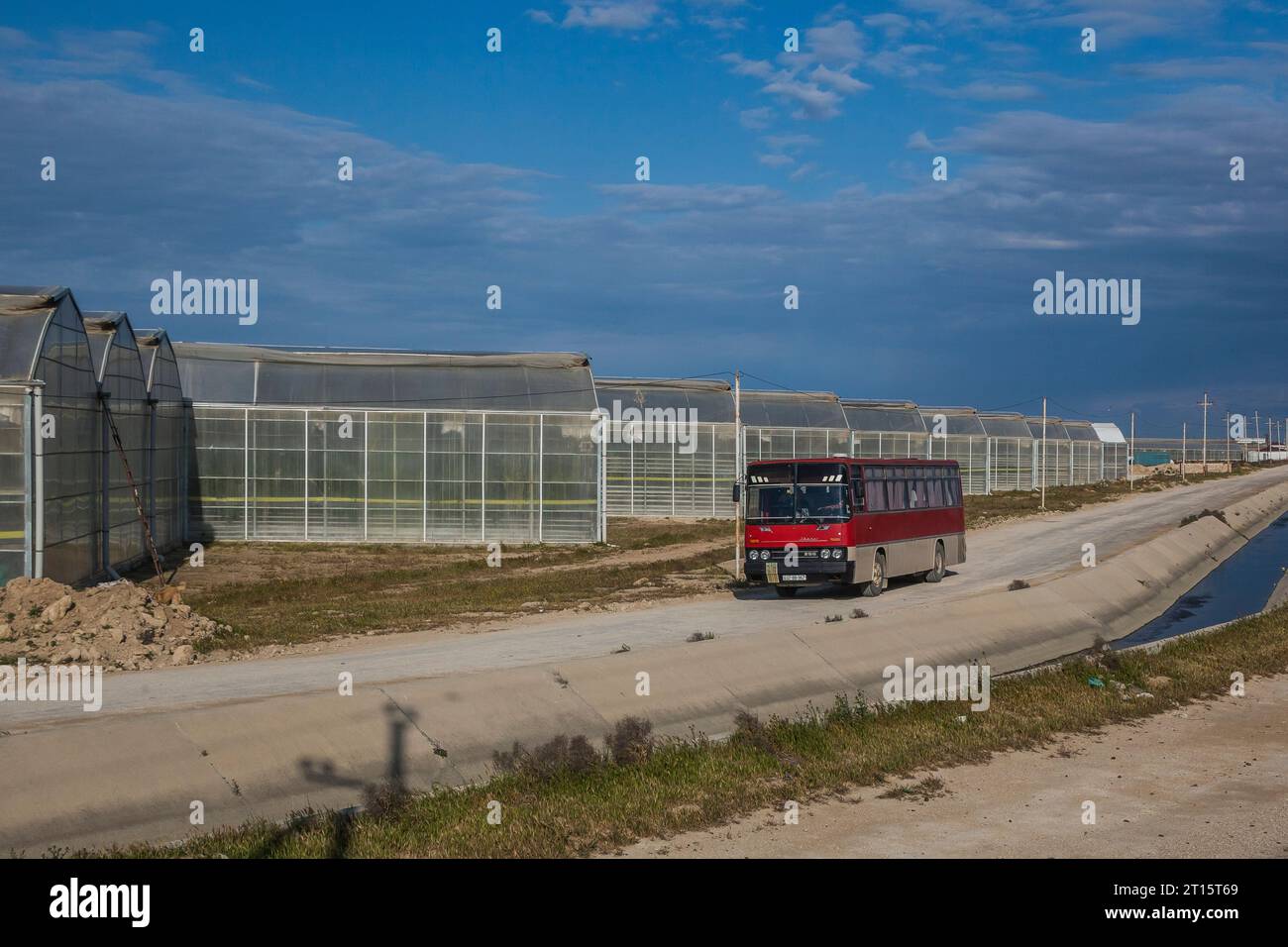 3.05.2023. Azerbaijan,Zire. Ikarus 256 with greenhouses. Stock Photo