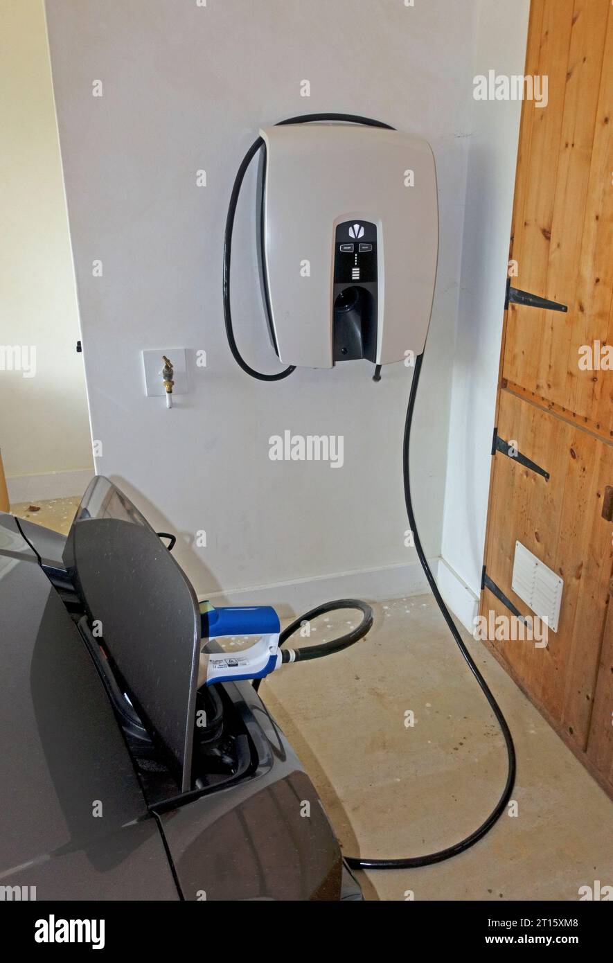 Revolutionary new Indra v2h electric vehicle charger enables chargibng of electric vehicle or supplying power to the house UK Stock Photo