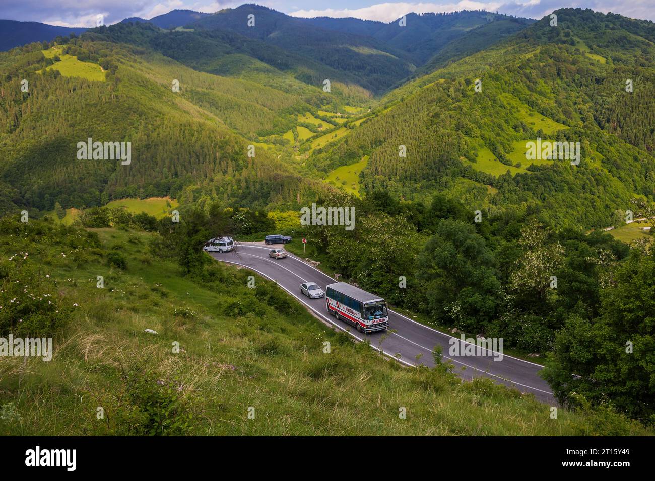 7.06.2022. Romania, road DN73. Setra S215HD going between mountains. Stock Photo