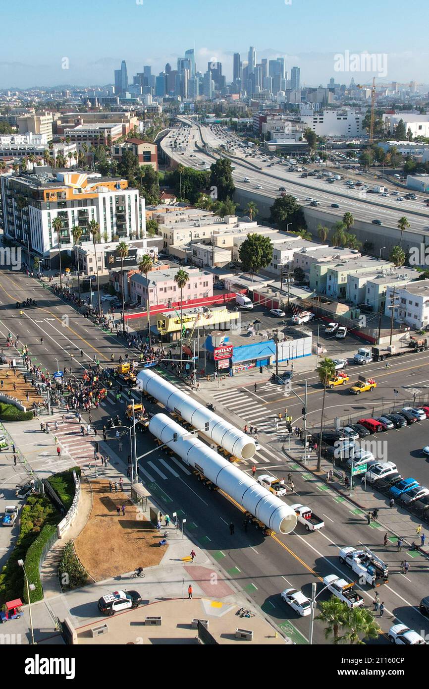 Los Angeles, California, USA. 11th Oct, 2023. A pair of large space-age Solid Rocket Motors are delivered through the streets of Exposition Park to the California Science Center on Wednesday, Oct, 11, 2023 in Los Angeles. The rocket motors are the major components of the twin Solid Rocket.Boosters that were used to help propel the shuttles into space. All of the launch components -- the shuttle, rocket boosters and a massive external fuel tank -- will be included in the vertical display of Endeavour at its new home in the 00 million Samuel Oschin Air and Space Center. (Credit Image Stock Photo