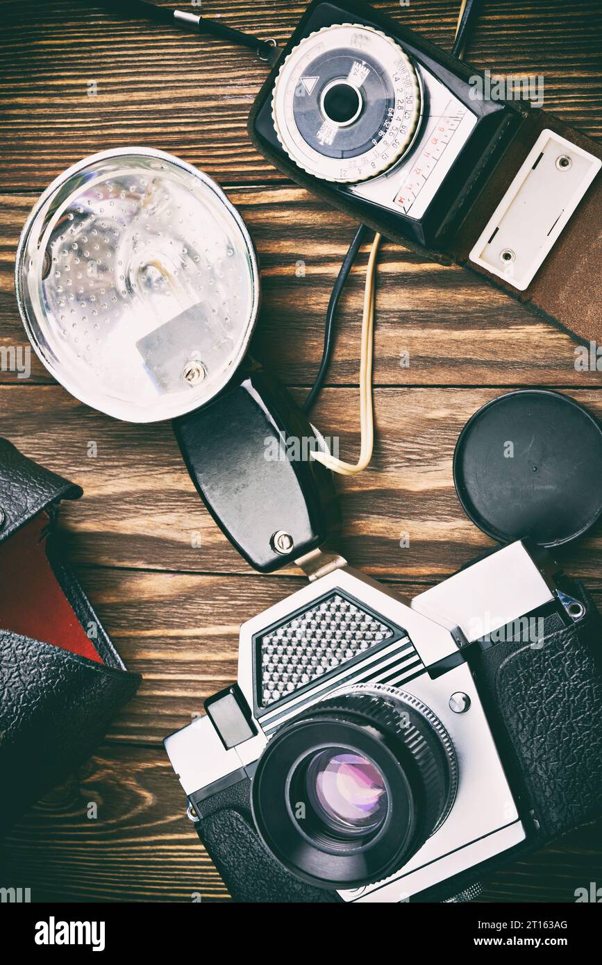 Old vintage film photo camera, flash and exposure meter Stock Photo Alamy