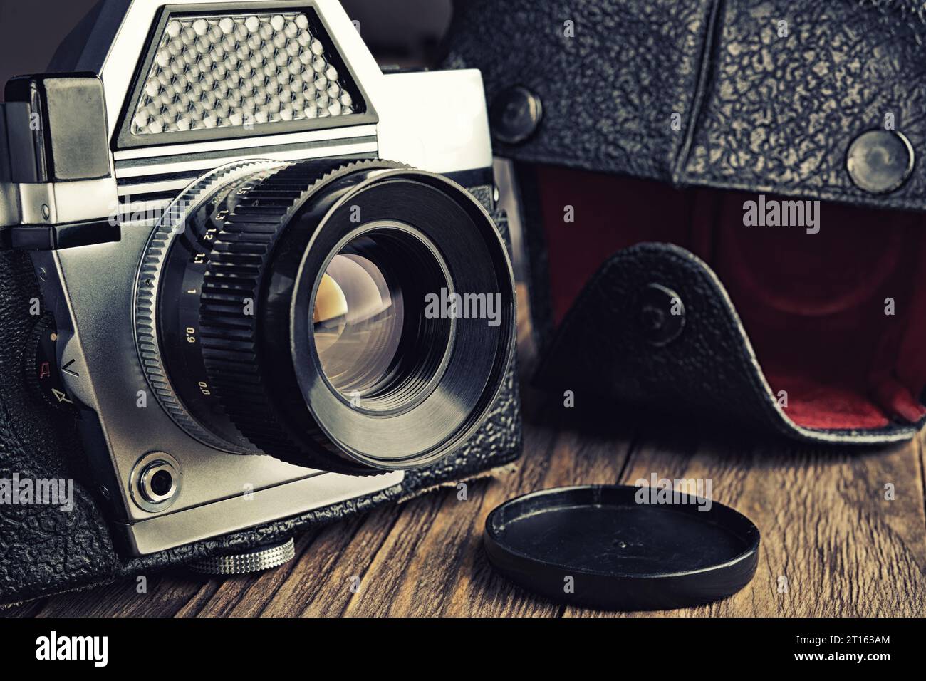 Old vintage photo camera and black leather case Stock Photo