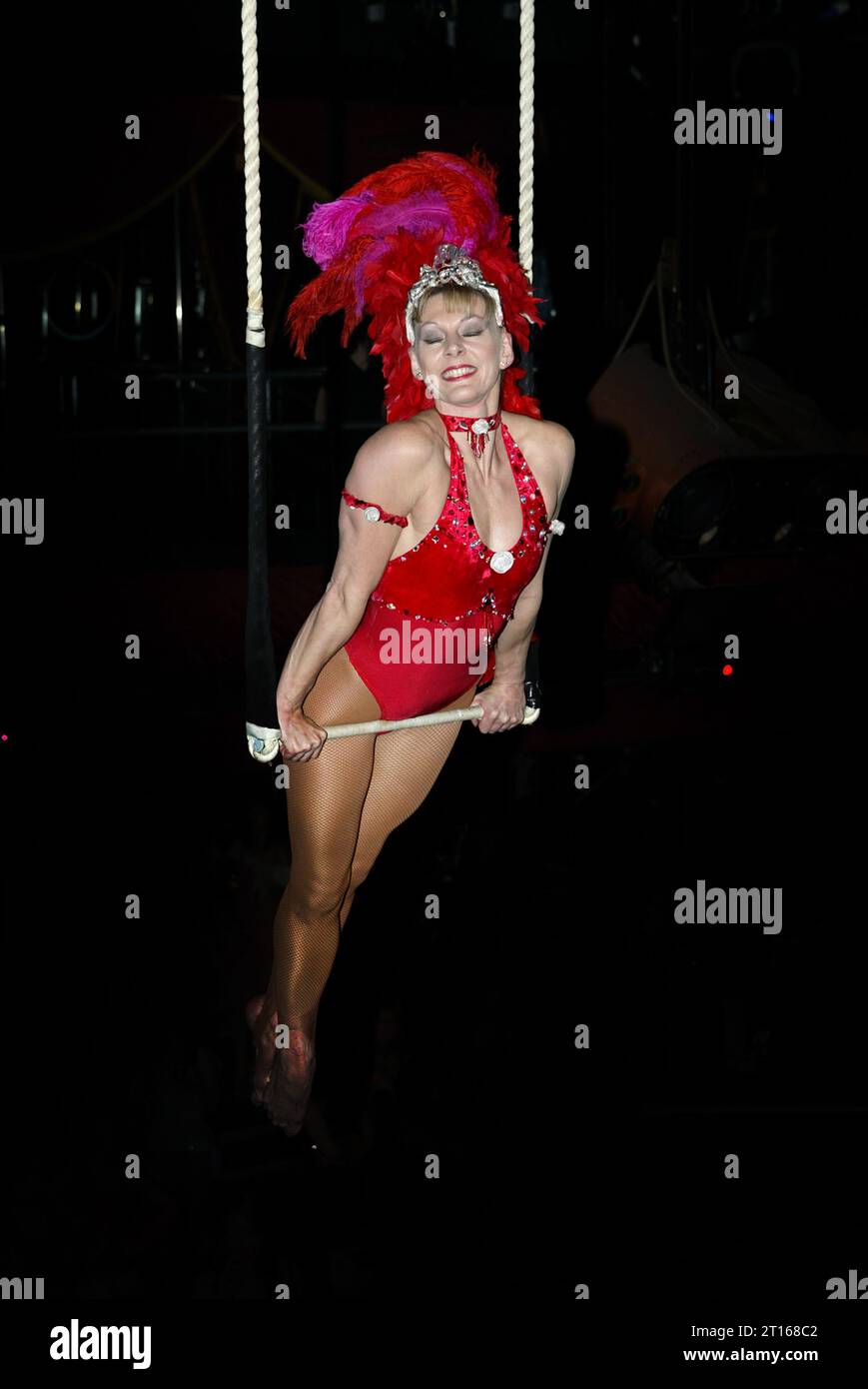 Trapeze artist performing in London nightclub Stock Photo