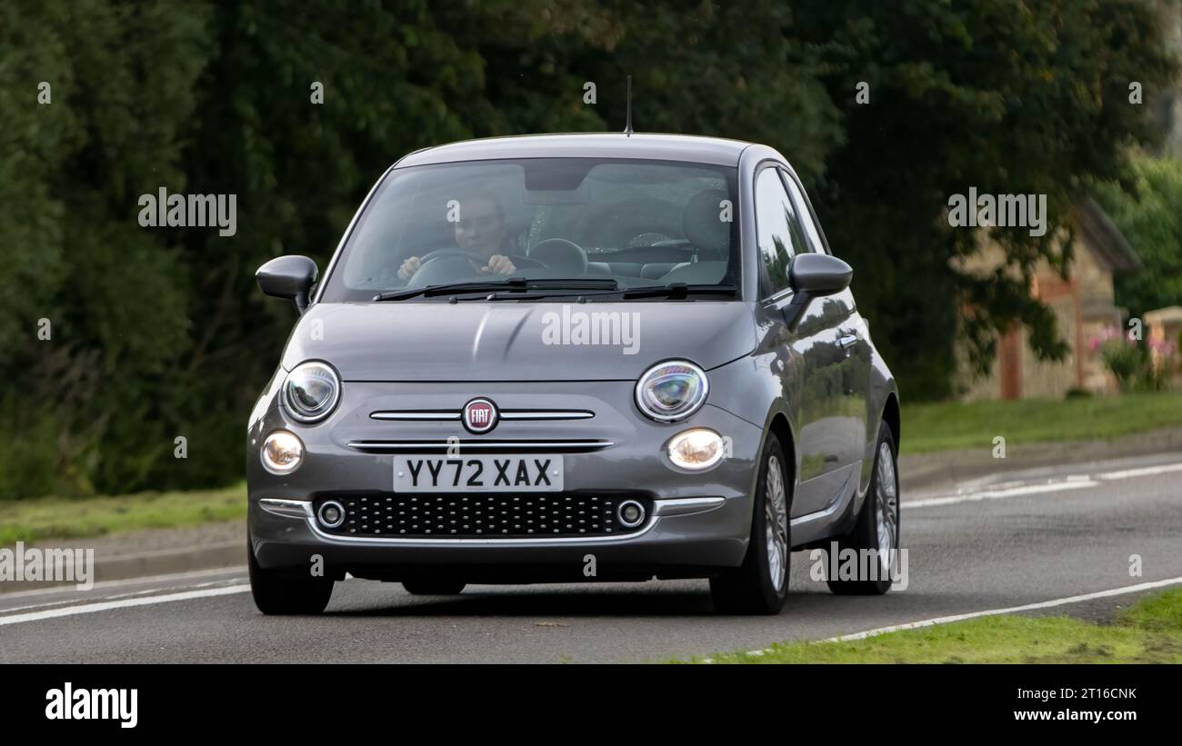 Bicester,Oxon.,UK - Oct 8th 2023: 2022 grey Fiat 500   classic car driving on an English country road. Stock Photo