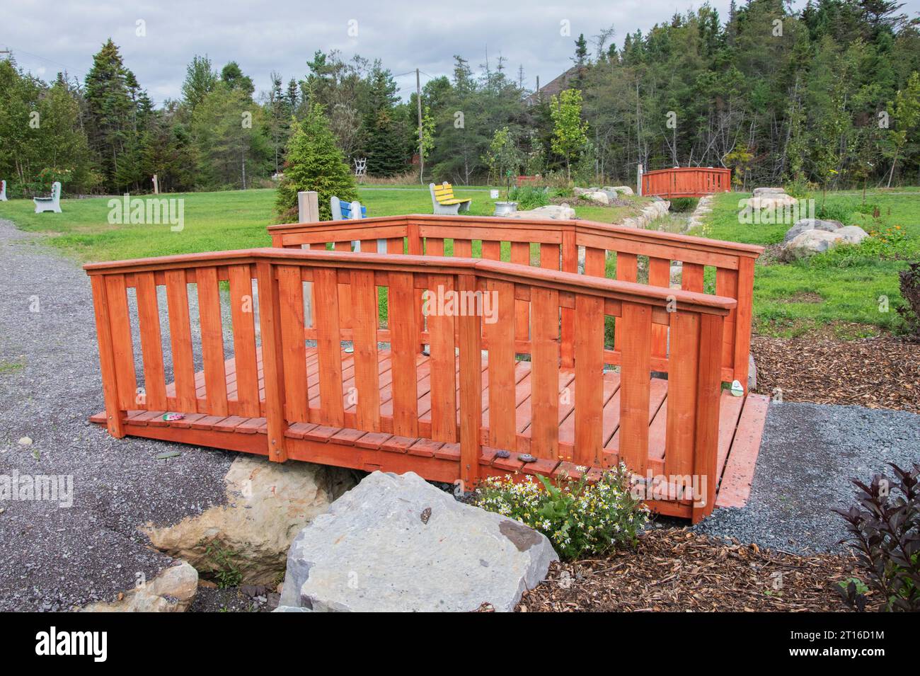 Red wooden bridges at the Cranford Family community park in New Harbour