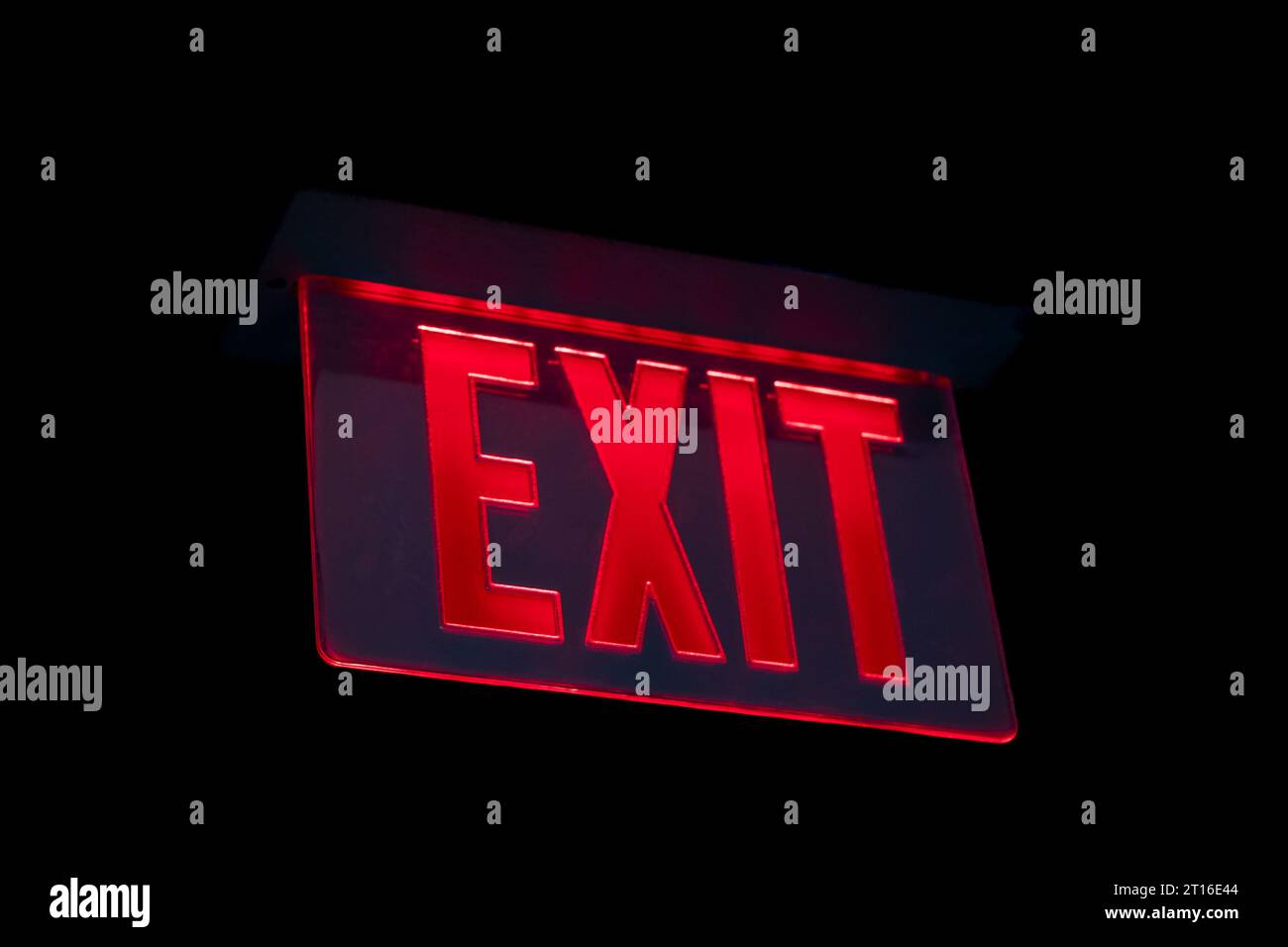 Exit sign with red letters centered on black background Stock Photo Alamy