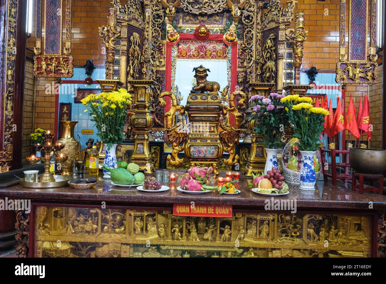 Can Tho, Vietnam. Offerings at Altar to Kuang Kung (Quan Cong) , Ong Temple (Chua Ong). Stock Photo