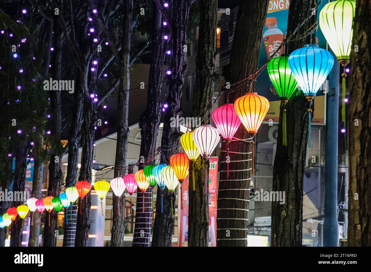 Lanterns on Hai Ba Trung Street Sidewalk, Can Tho, Vietnam. Nighttime Street Scene. Stock Photo