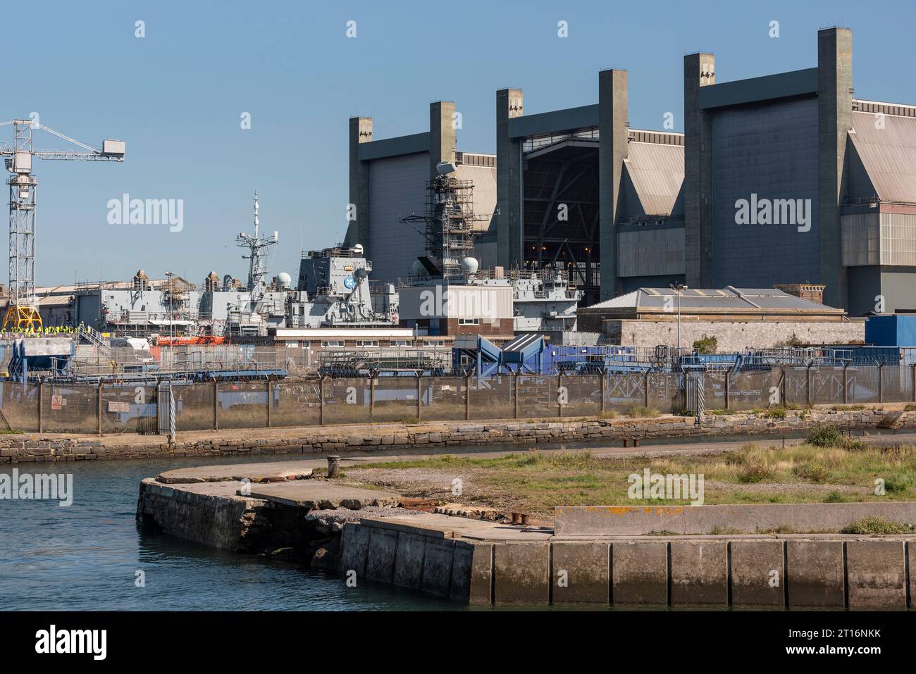 Plymouth, Devon, England, UK.  06. 09. 2023.  Navy ship in for repair at the largest navy repair yard in western Europe. HMNB Devonport. UK. Stock Photo