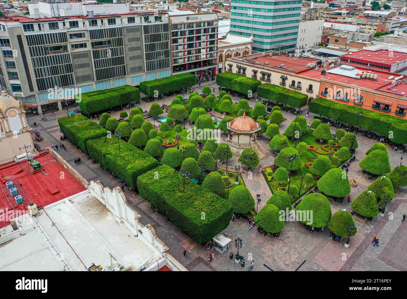 Kiosk and trees in the main garden in the historic center of León ...