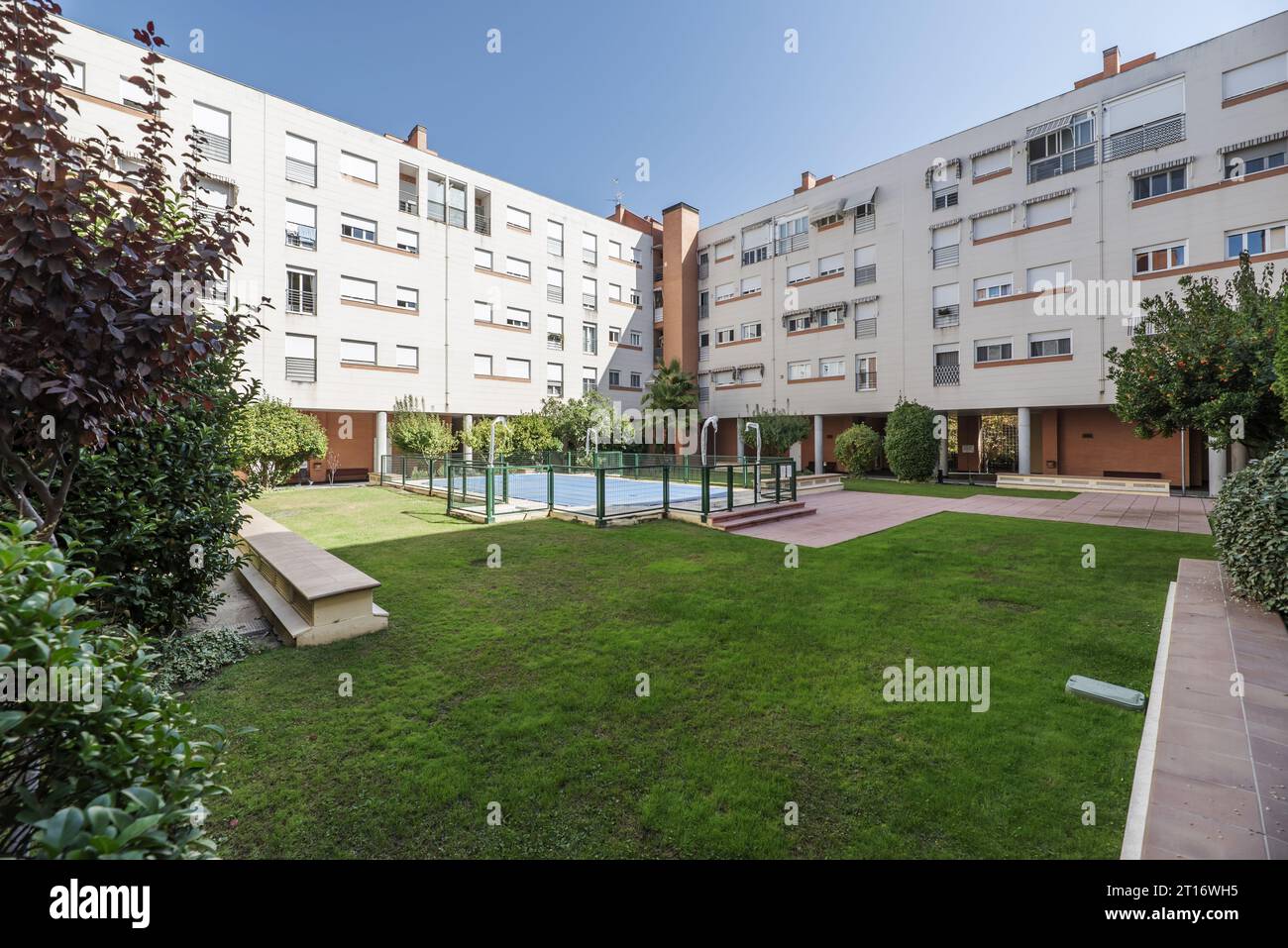 Shared Communal Pool Views of a communal pool in a residential development covered with blue ...