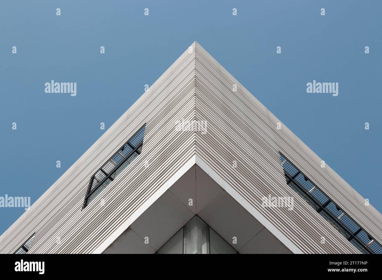 Abstract geometric pattern of a modern aluminium building facade Stock Photo