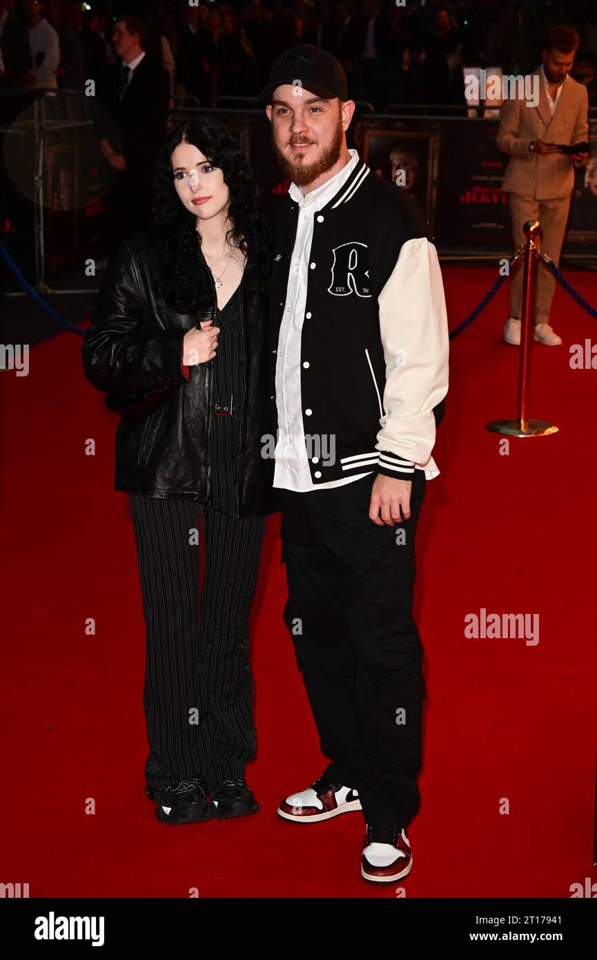 Odeon Luxe, Leicester Square, London, UK. 11th Oct, 2023. Holly Laing and geust attends the World Premiere of Doctor Jekyll with Eddie Izzard, London, UK. Credit: See Li/Picture Capital/Alamy Live News Stock Photo