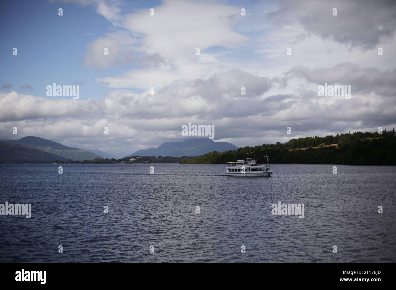 File photo dated 16/07/2014 of a pleasure cruise sails into the southern end of Loch Lomond, in Scotland. Nominations have opened for Scotland's next national park, with 10 expressions of interest already lodged with the Government. Communities and organisations have been asked to submit their plans to become the third national park - after Loch Lomond and the Trossachs, and the Cairngorms. A number of areas have already submitted expressions of interest, including Galloway, the Scottish Borders, the Tay Forest, Lochaber, Skye and Raasay, Affric to Alladale, Glen Affric, the Lammermuirs, Largo Stock Photo